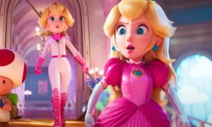 Princess Peach, from the Mario movie, in her pink ballgown, beside herself in her white and pink motorcycle outfit